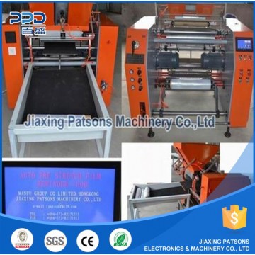 Pre-stretch film oscillating rewinder machine